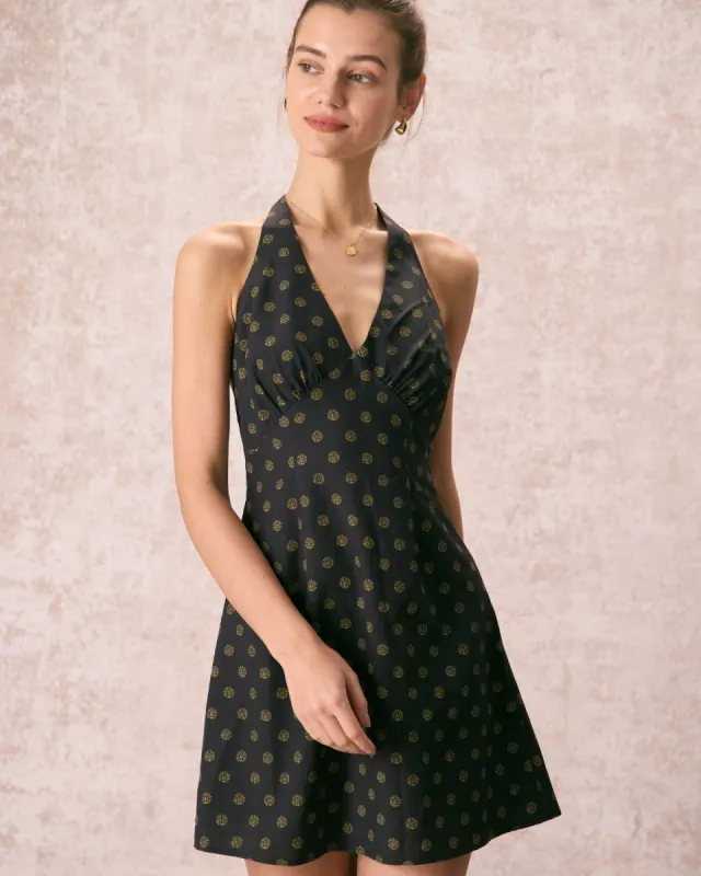 The Black Halter Floral A-Line Mini Dress sold by rihoas