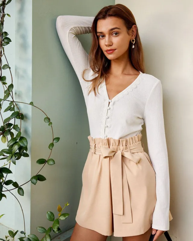 The White V Neck Lace Trim Ribbed Knit Tee sold by rihoas