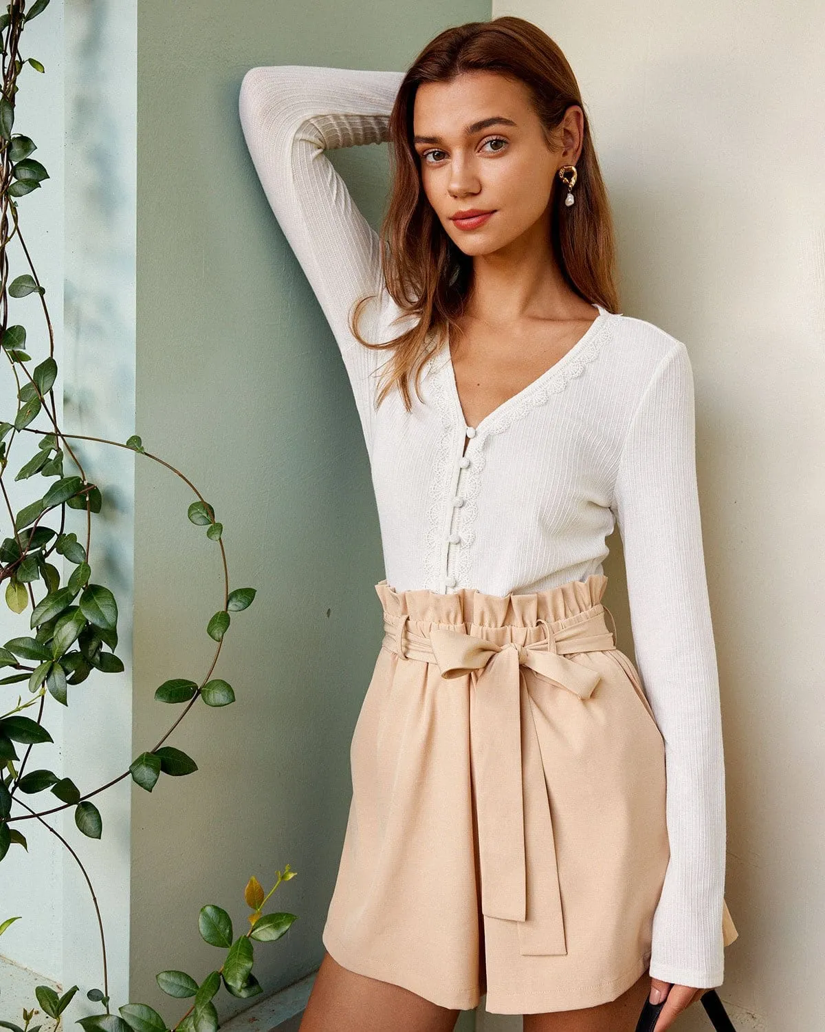 The White V Neck Lace Trim Ribbed Knit Tee sold by rihoas