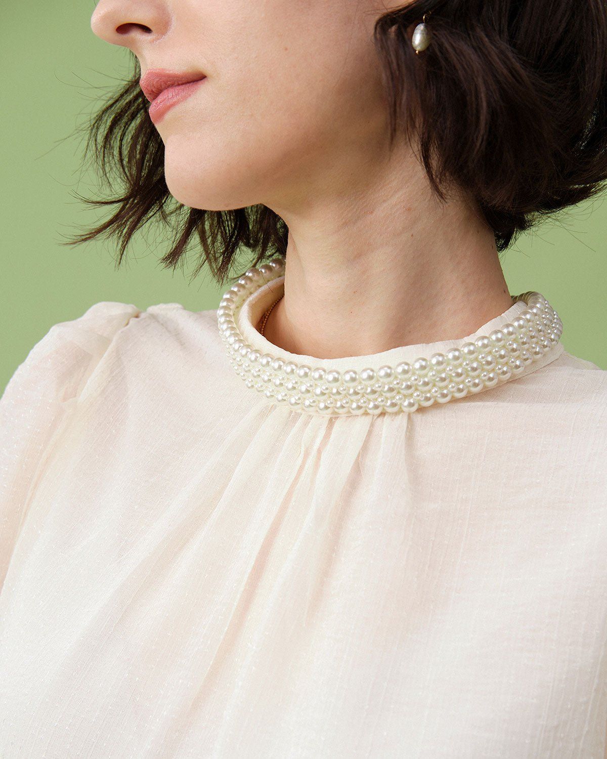 The Beige Mock Neck Sheer Sleeve Blouse sold by rihoas product image thumbnail 2