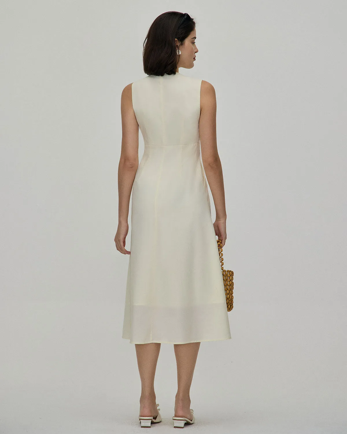 The Yellow V Neck Sleeveless Midi Dress sold by rihoas product image thumbnail 5