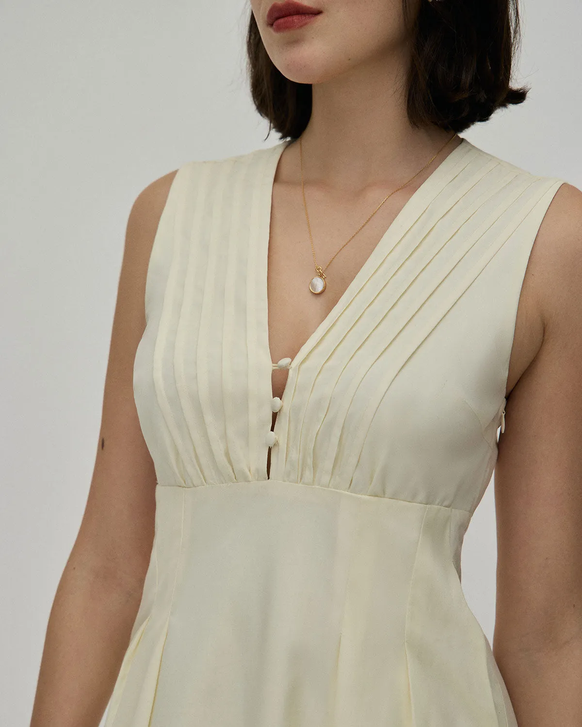 The Yellow V Neck Sleeveless Midi Dress sold by rihoas product image thumbnail 2