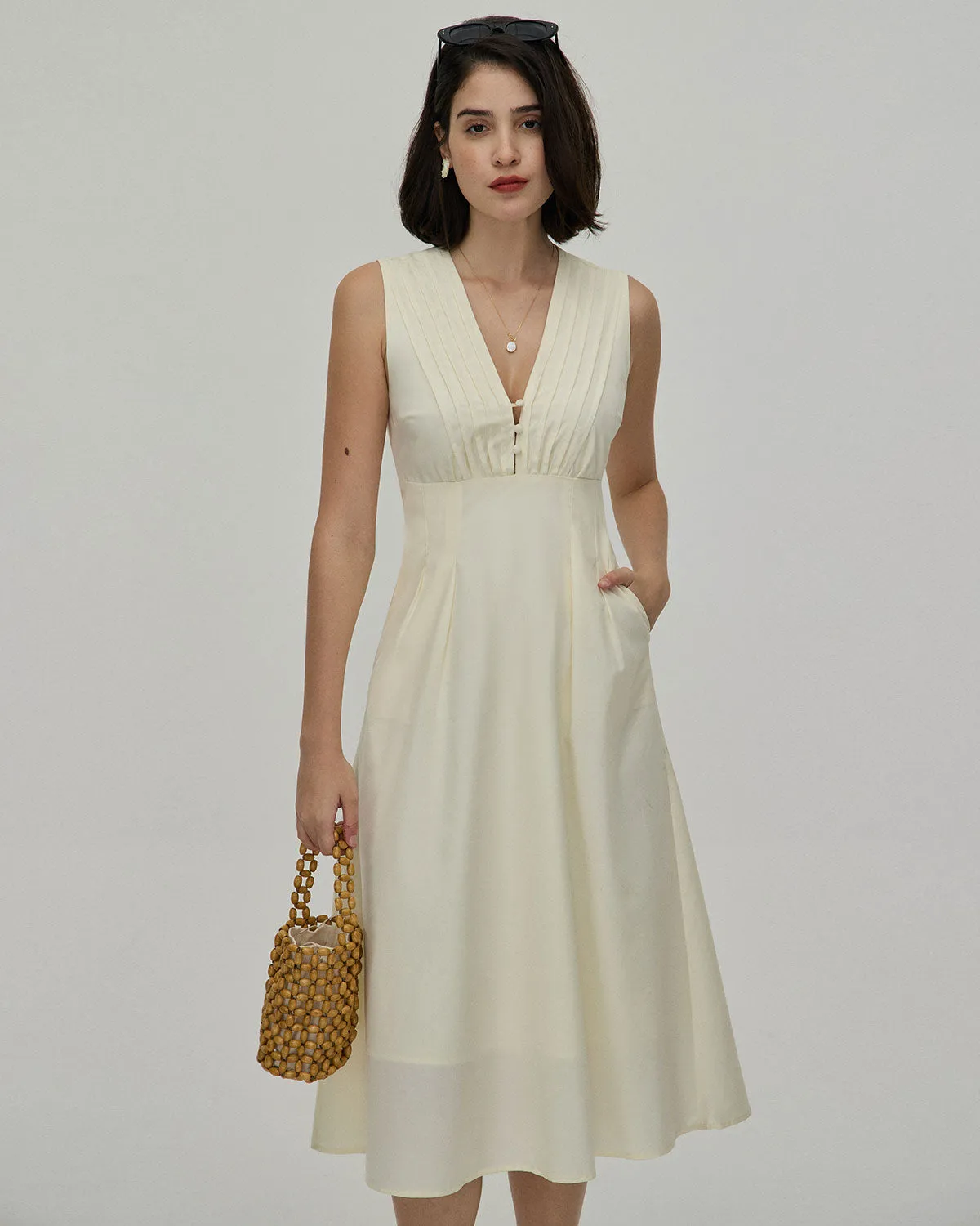 The Yellow V Neck Sleeveless Midi Dress sold by rihoas