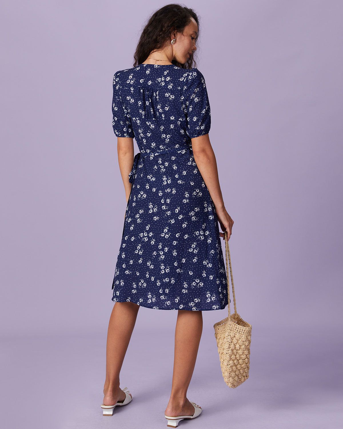 The Navy V Neck Floral Button Wrap Midi Dress sold by rihoas product image thumbnail 5