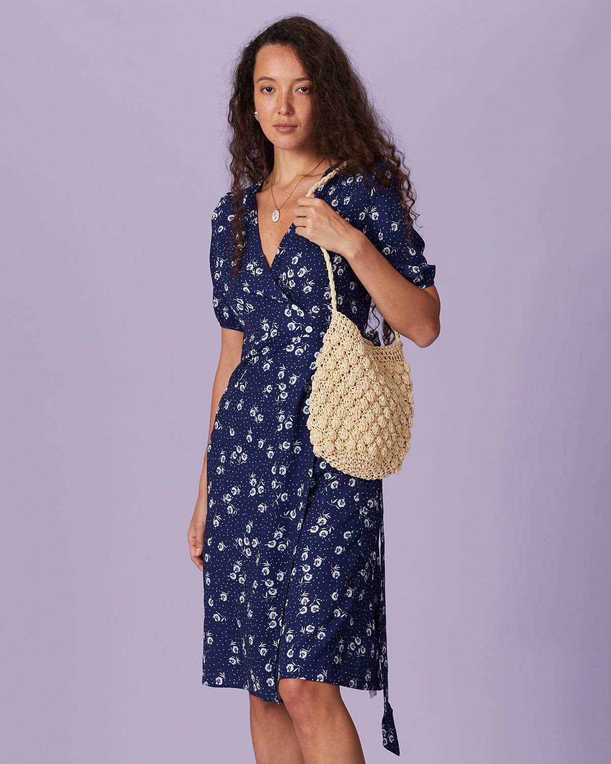 The Navy V Neck Floral Button Wrap Midi Dress sold by rihoas product image thumbnail 2