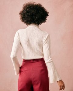 The White Turtleneck Flare Sleeve Knit Top sold by rihoas