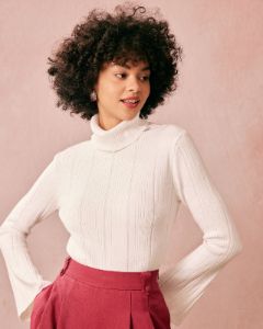 The White Turtleneck Flare Sleeve Knit Top sold by rihoas