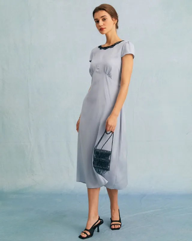 The Blue Round Neck Lace Trim Satin Midi Dress sold by rihoas