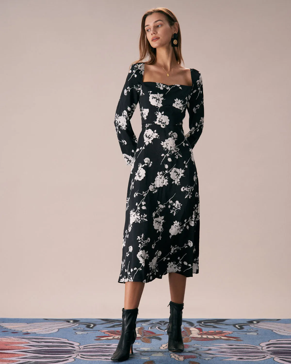 The Black Sweetheart Neck Floral Midi Dress sold by rihoas