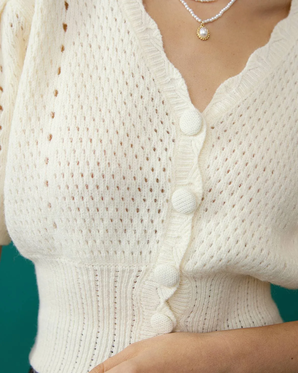 The Short-Sleeve Cutout Knitted Top sold by rihoas product image thumbnail 3