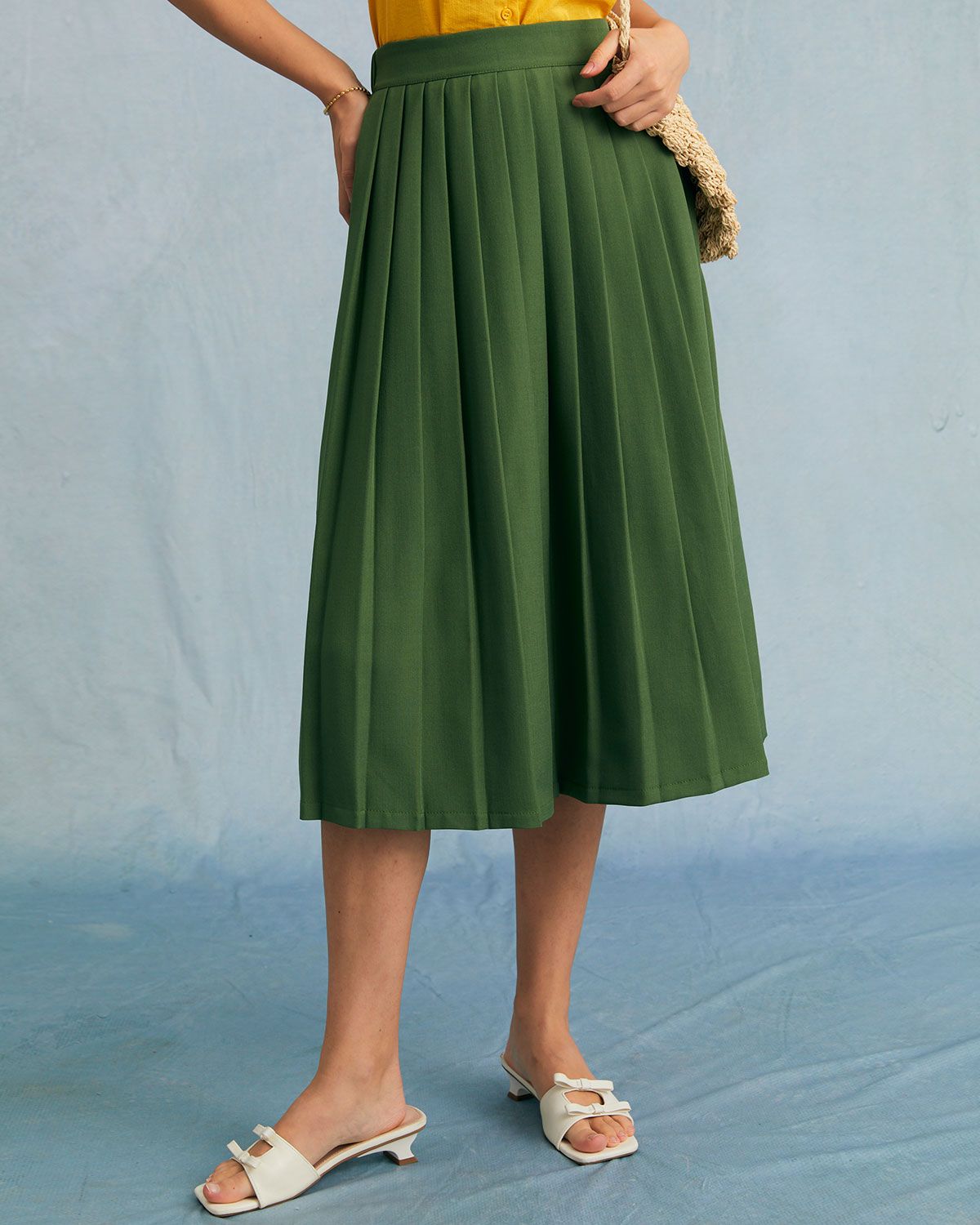 The Green High Waisted Pleated Midi Skirt sold by rihoas