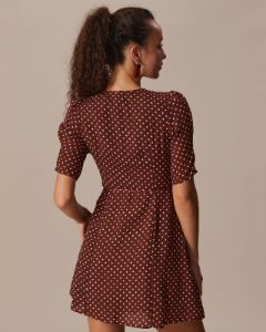 The Brown V Neck Polka Dot Wrap Mini Dress sold by rihoas