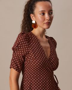 The Brown V Neck Polka Dot Wrap Mini Dress sold by rihoas