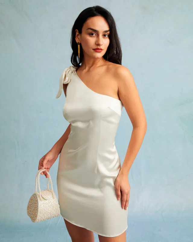 The Beige One Shoulder Bow Satin Mini Dress sold by rihoas