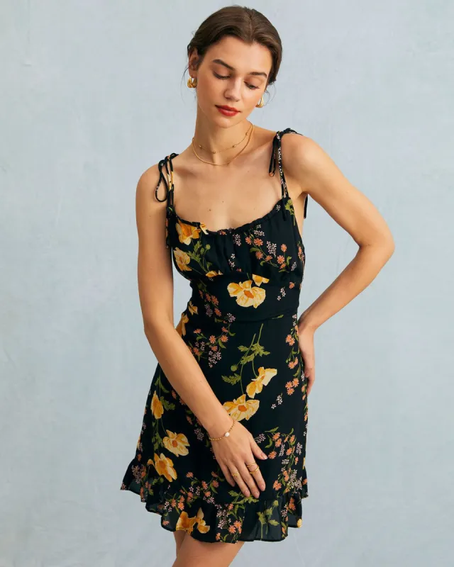 The Black High Waisted Floral Ruffle Mini Dress sold by rihoas