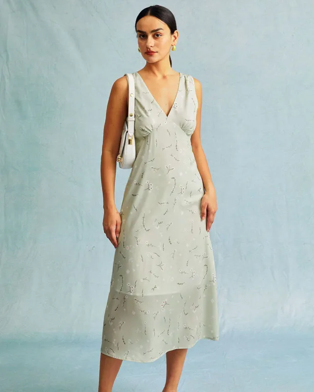The Light Green V Neck Floral Ruched Midi Dress sold by rihoas