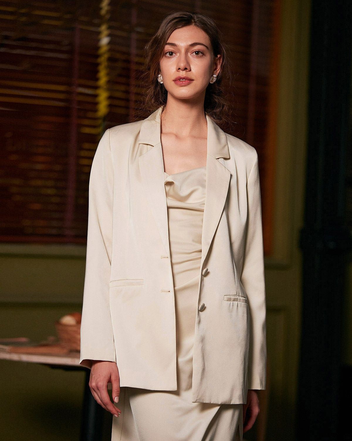 The Solid Collared Single-breasted Blazer sold by rihoas