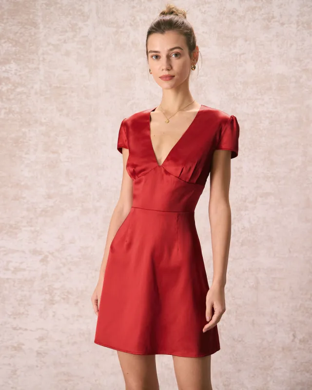 The Red V Neck Ruched Satin Mini Dress sold by rihoas