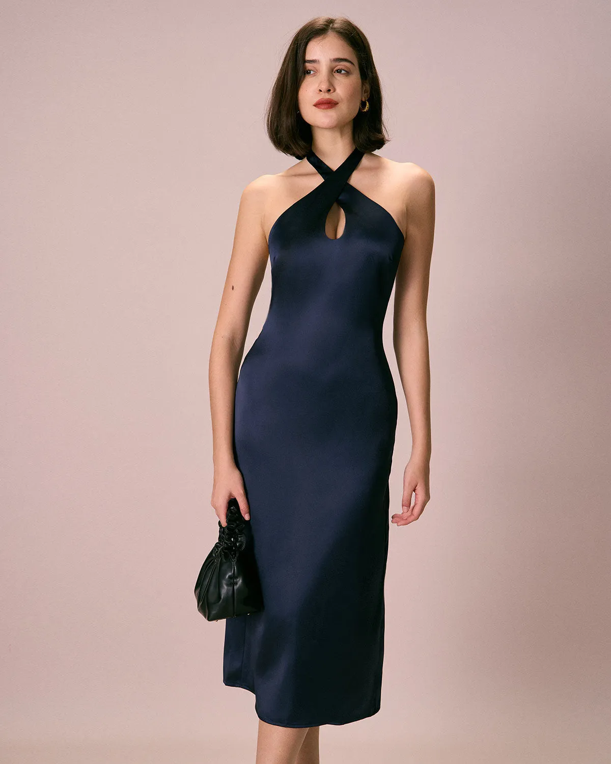 The Navy Cut-Out Satin Halter Midi Dress sold by rihoas