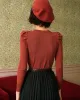 The Solid Puff Sleeve Slim-fitting Knit Top sold by rihoas
