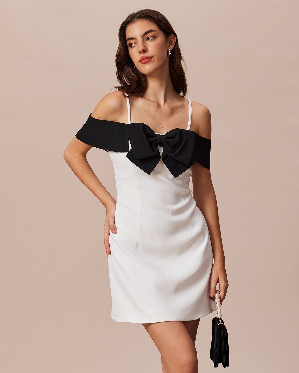 The White Off The Shoulder Bowknot Mini Dress sold by rihoas