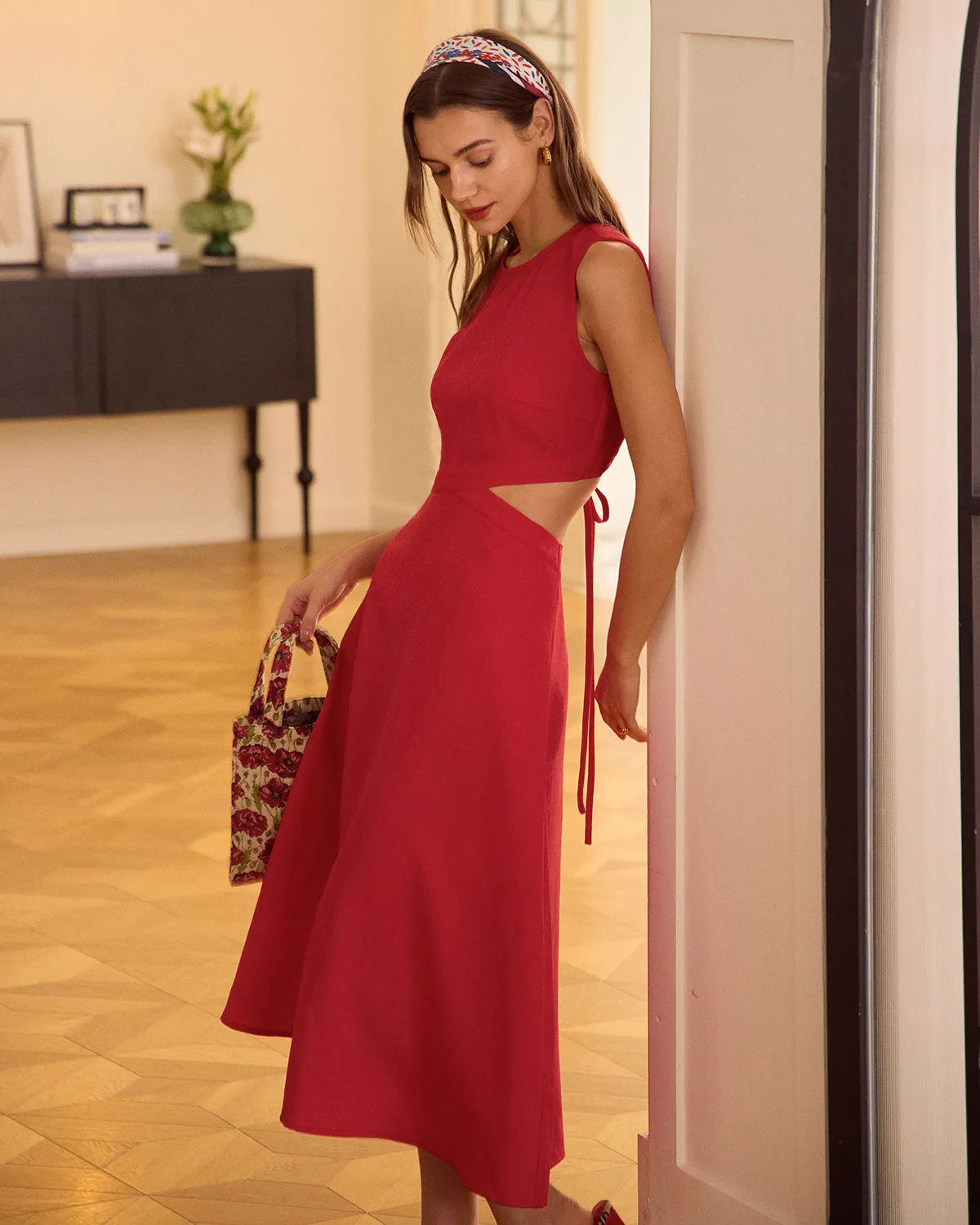 The Red Round Neck Cut-Out Midi Dress sold by rihoas
