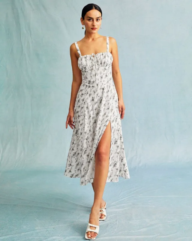 The White Sweetheart Neck Floral Cutout Midi Dress sold by rihoas