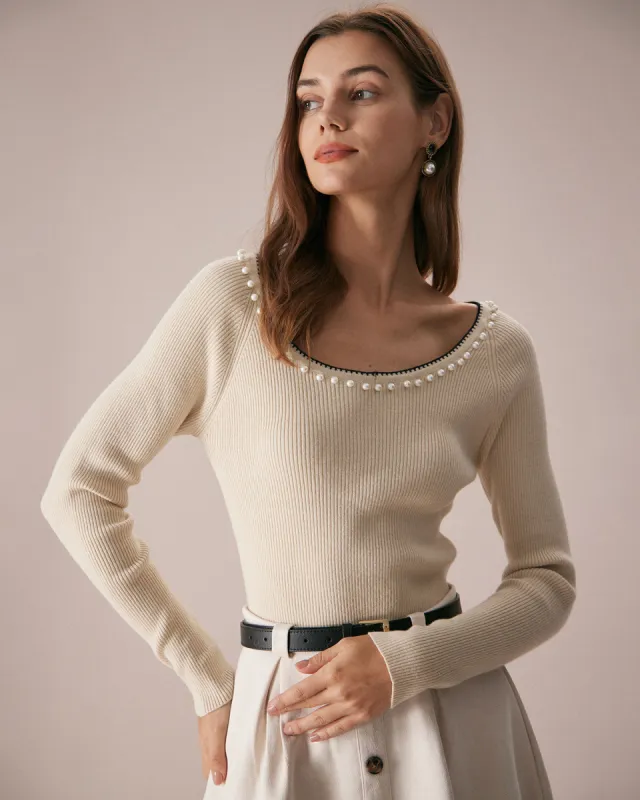 The Apricot Round Neck Pearl Trim Knit Top sold by rihoas