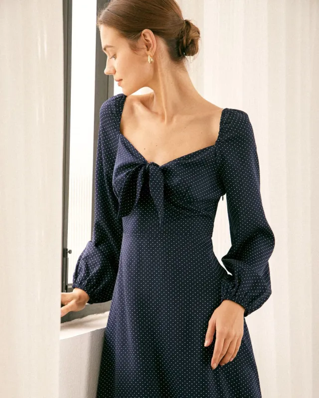 The Navy Knot Front  Polka Dot Midi Dress sold by rihoas