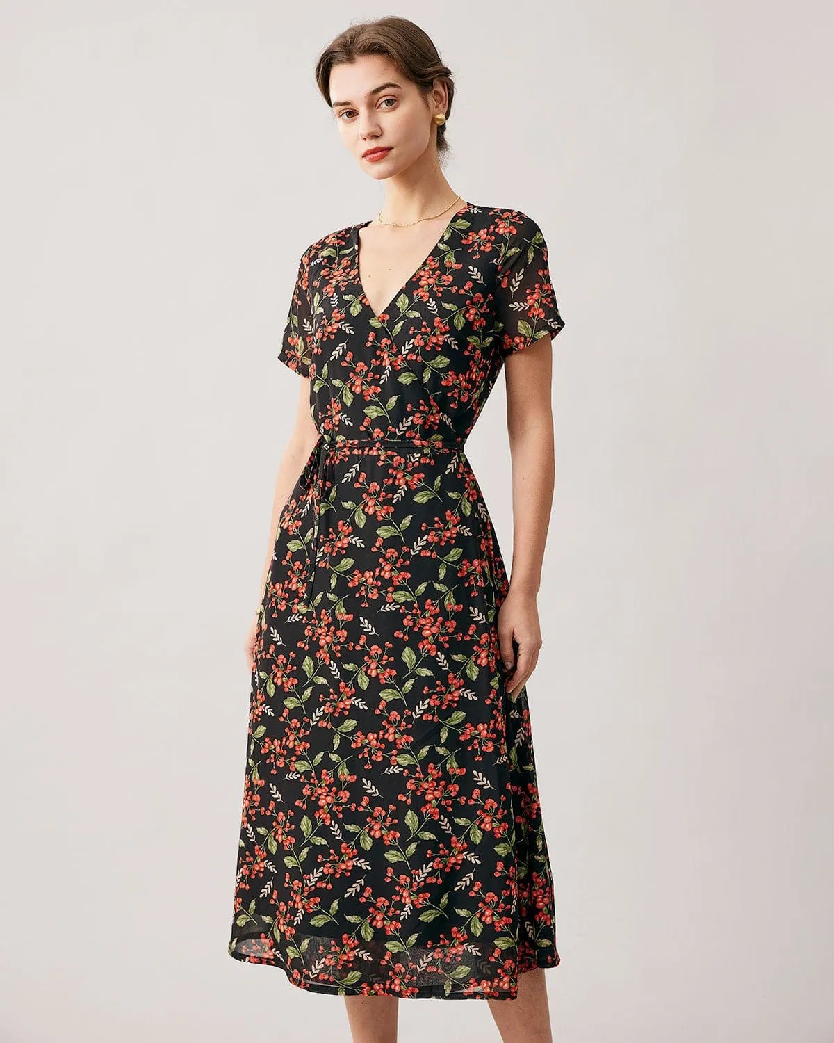 The Black V Neck Fruit Print Wrap Midi Dress sold by rihoas