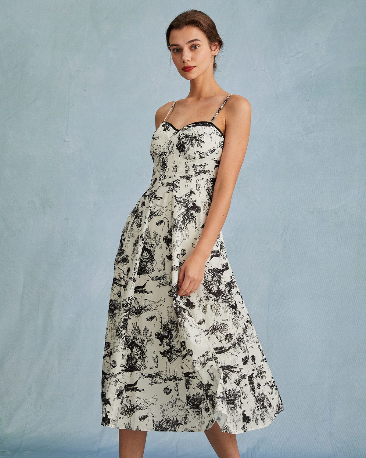 The Black Sweetheart Neck Floral Slip Midi Dress sold by rihoas