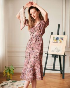 The V Neck Puff Sleeve Retro Midi Dress sold by rihoas