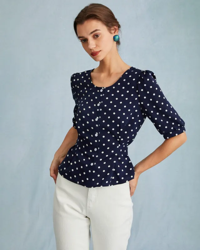 The Navy Puff Sleeve Polka Dot Tie Back Blouse sold by rihoas