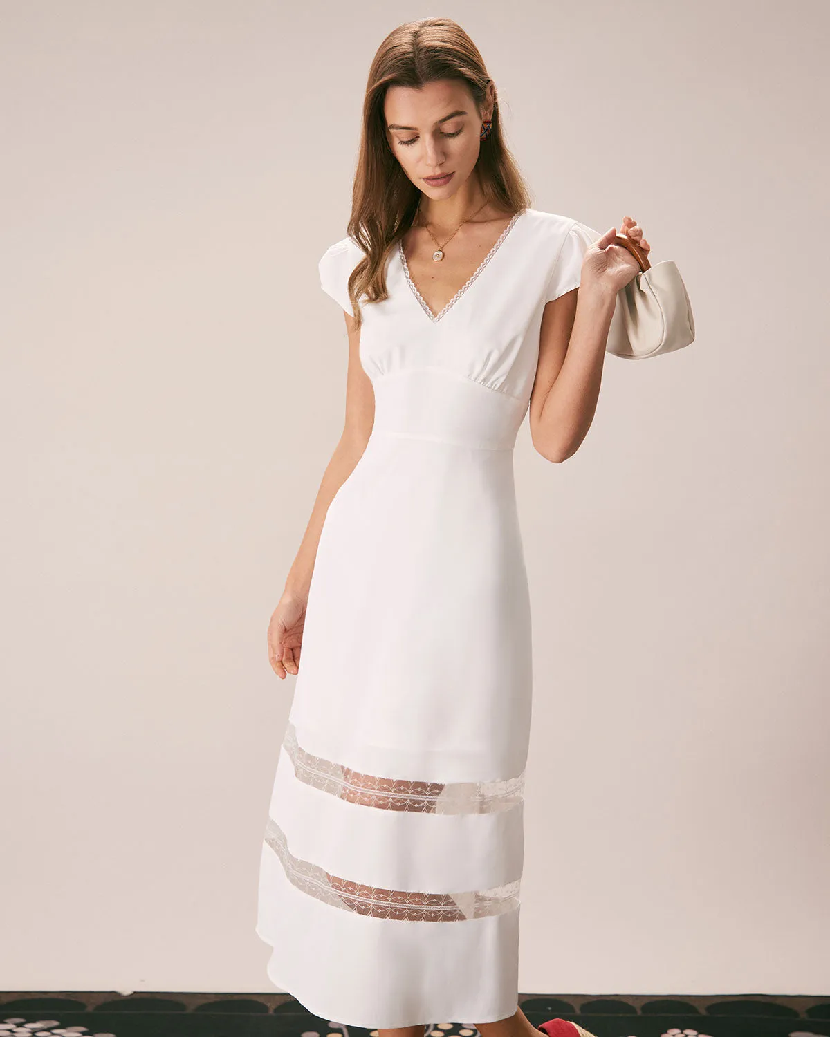 The White V Neck Lace Cap Sleeve Midi Dress sold by rihoas product image thumbnail 4