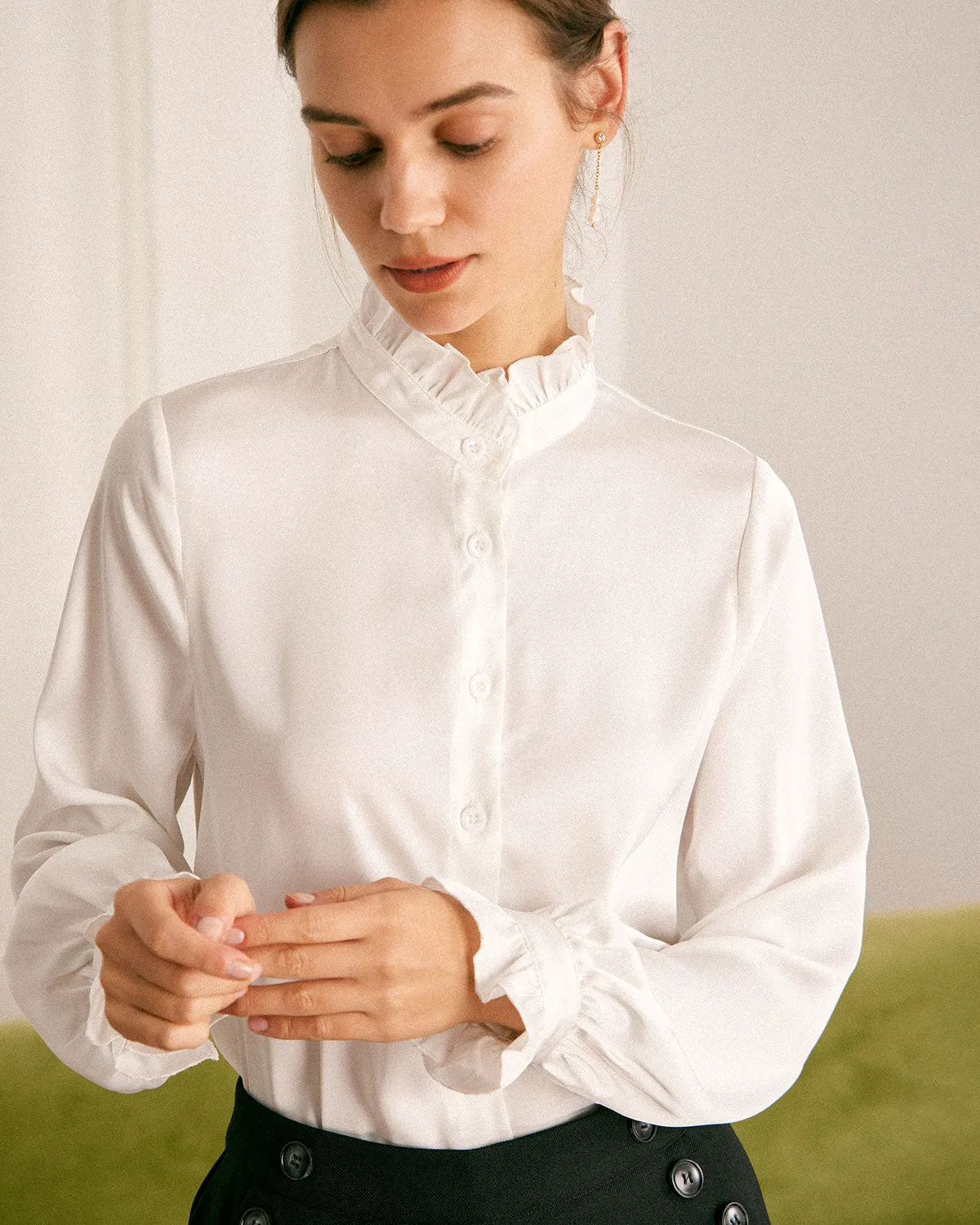 The White Mock Neck Ruffled Satin Shirt sold by rihoas