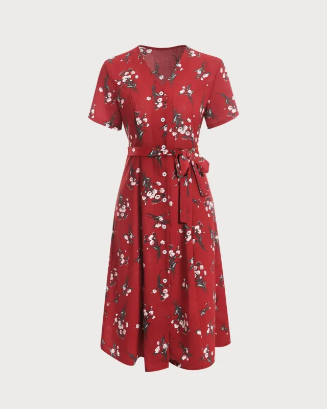 The V Neck Knotted Floral Midi Dress sold by rihoas
