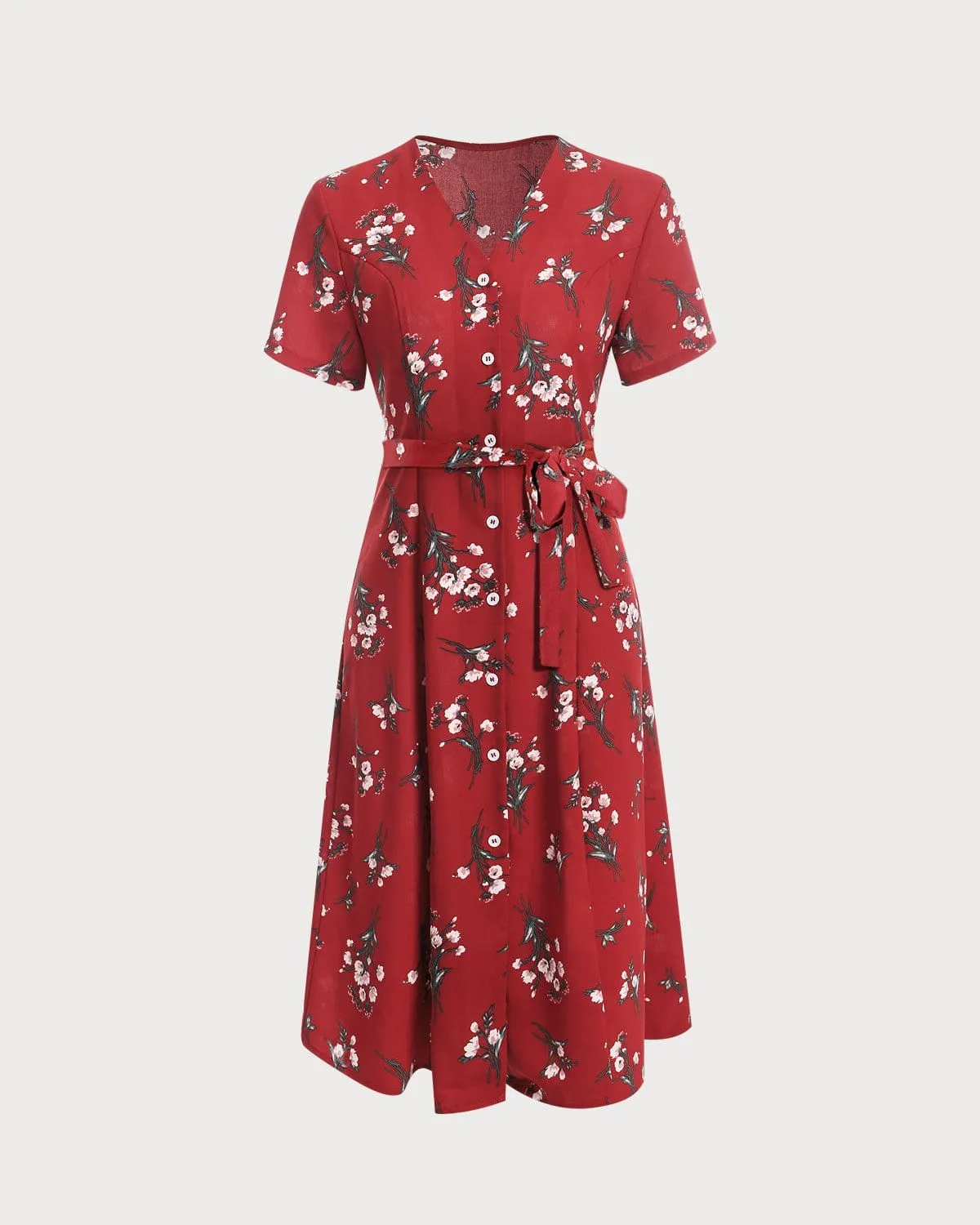 The V Neck Knotted Floral Midi Dress sold by rihoas