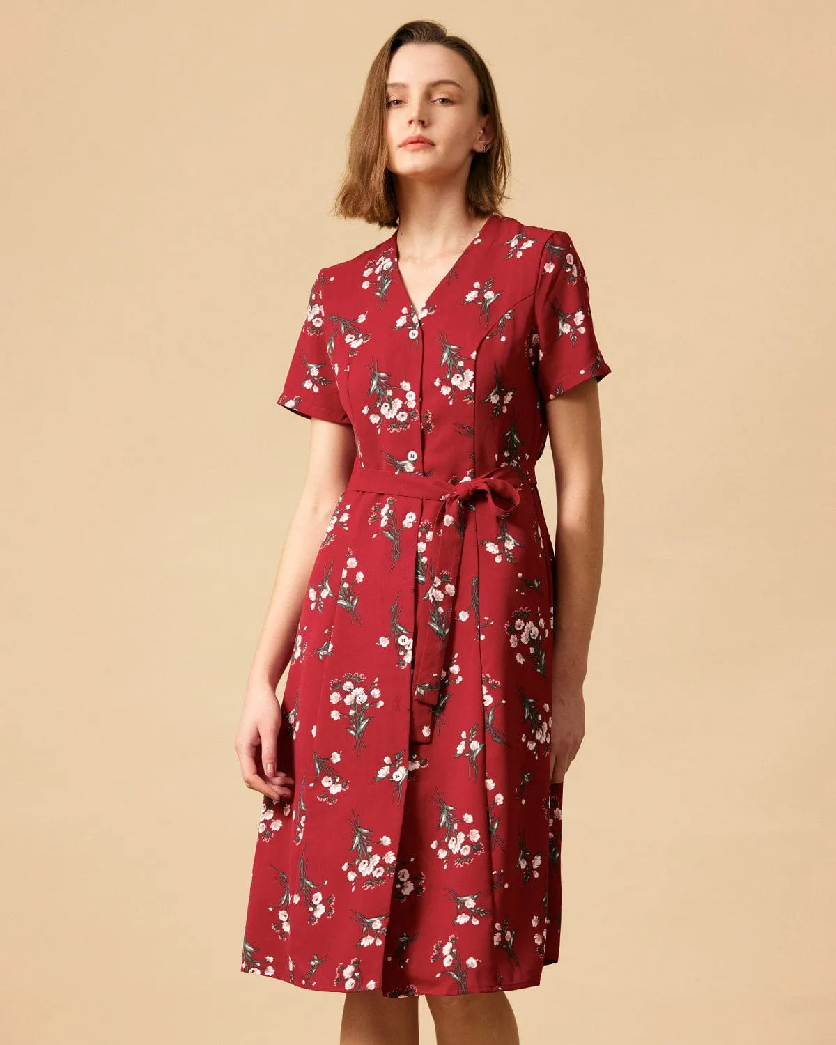 The V Neck Knotted Floral Midi Dress sold by rihoas product image thumbnail 2
