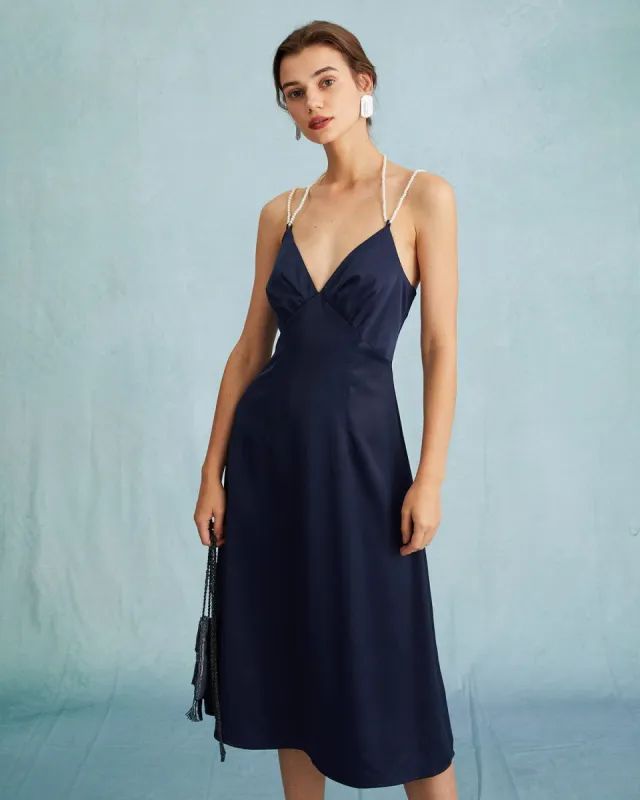 The Navy Satin V Neck Sleeveless Pearl Strap Midi Dress sold by rihoas