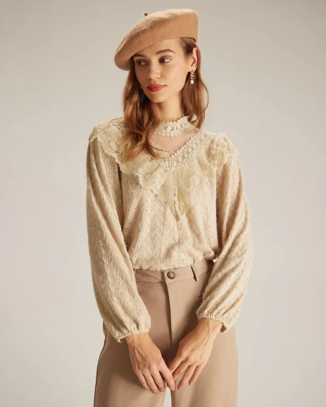 The Khaki Mock Neck Lantern Sleeve Blouse sold by rihoas