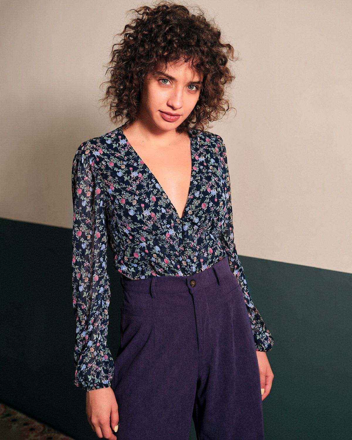 The V Neck Lantern Sleeve Floral Blouse sold by rihoas