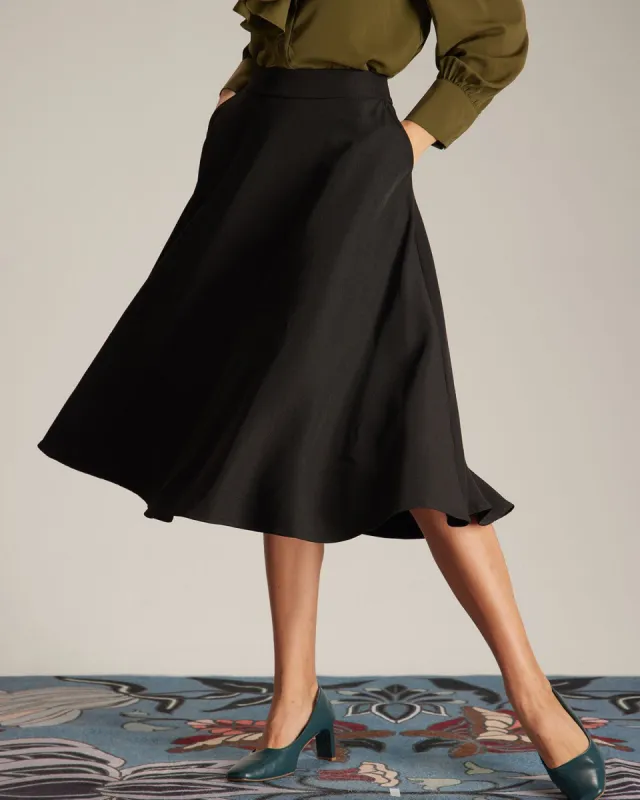 The Black Natural Waisted Umbrella Midi Skirt made by rihoas