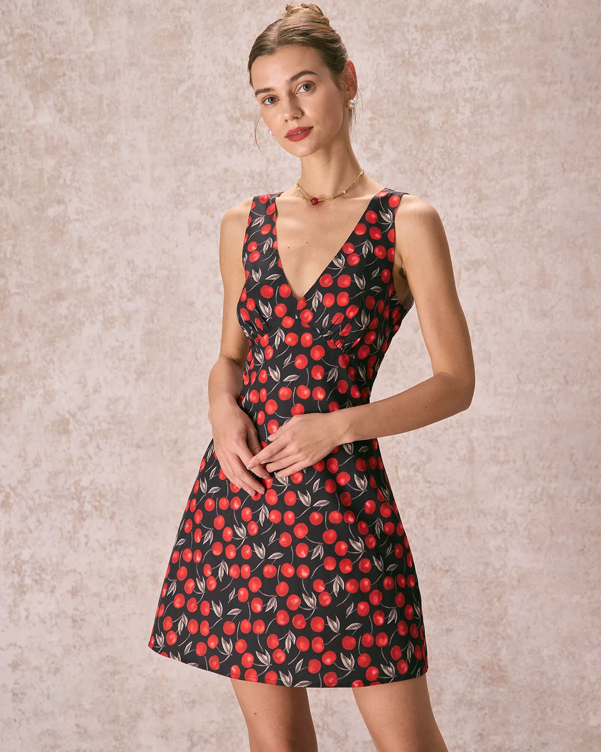 The Multi V Neck Cherry Print Mini Dress sold by rihoas