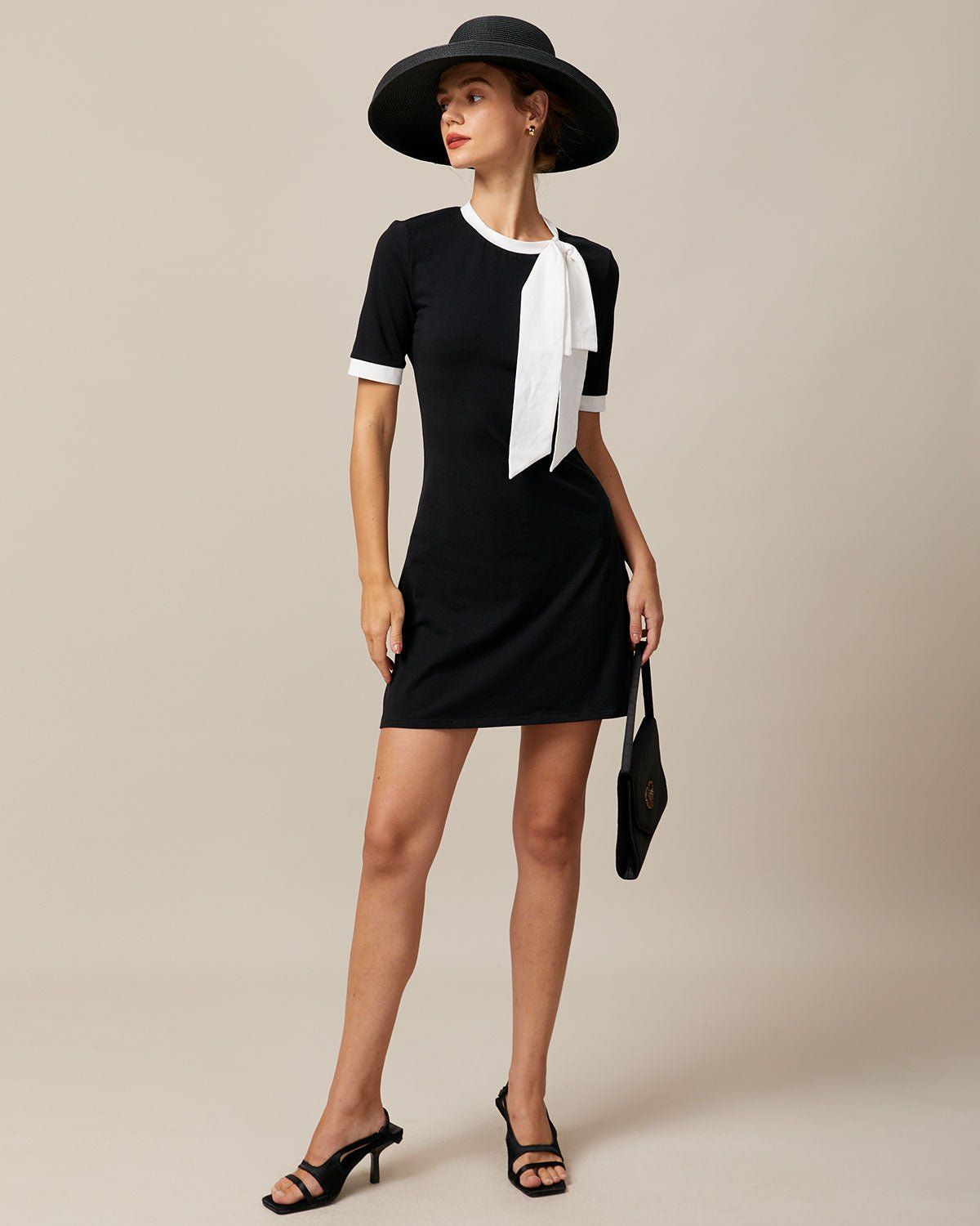 The Black Round Neck Bowknot Mini Dress sold by rihoas product image thumbnail 2