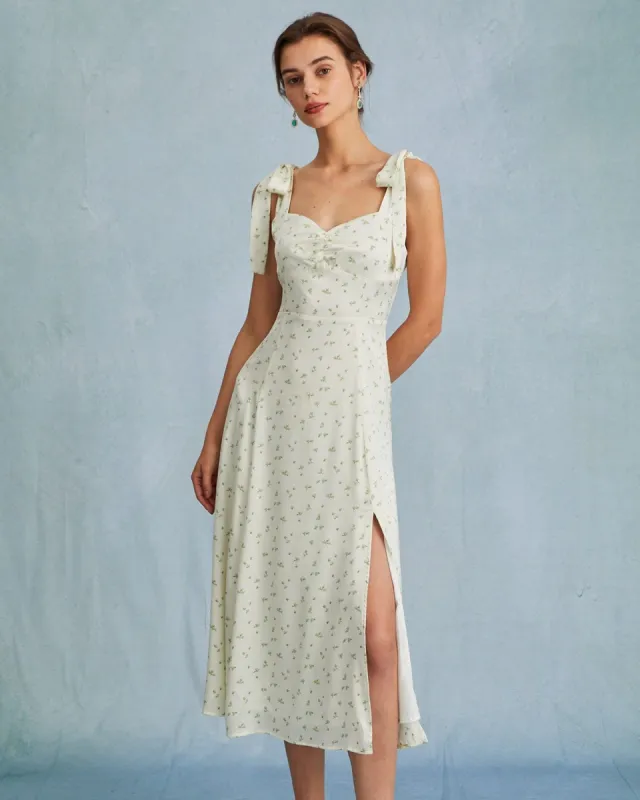 The Light Green Satin Floral Tie Strap Slit Midi Dress sold by rihoas
