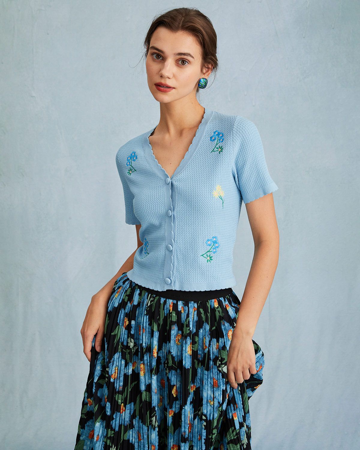 The Blue V Neck Floral Embroidery Knit Tee sold by rihoas