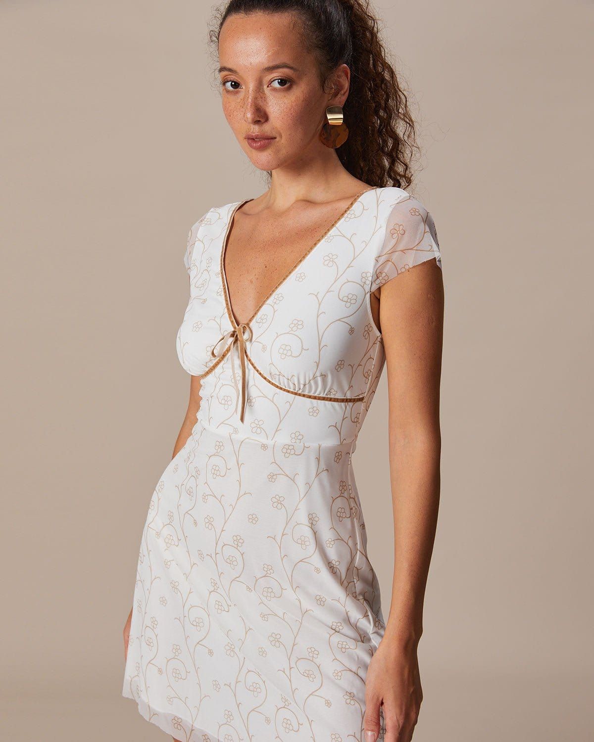 The White V Neck Floral Contrasting Mini Dress sold by rihoas product image thumbnail 4