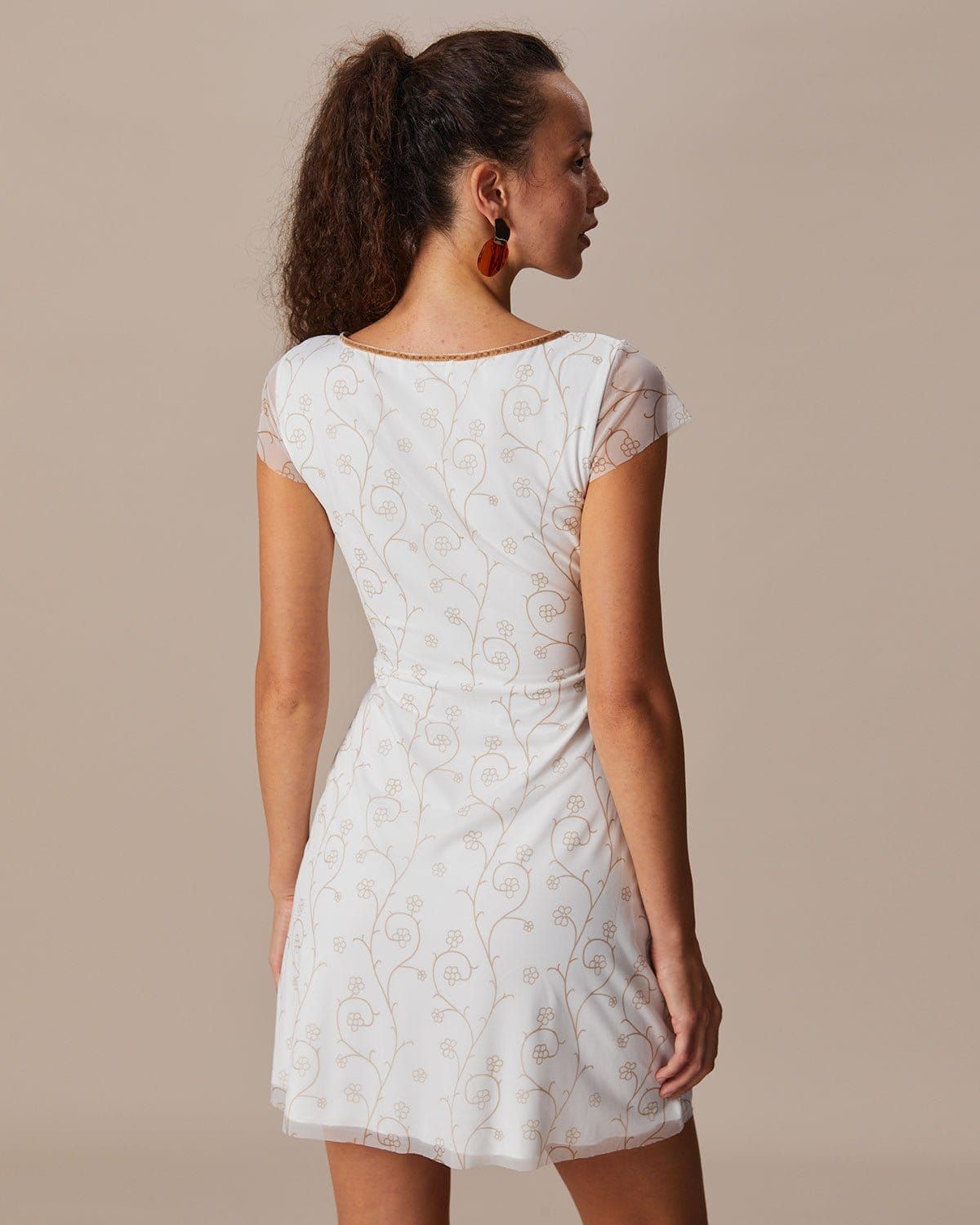 The White V Neck Floral Contrasting Mini Dress sold by rihoas product image thumbnail 5
