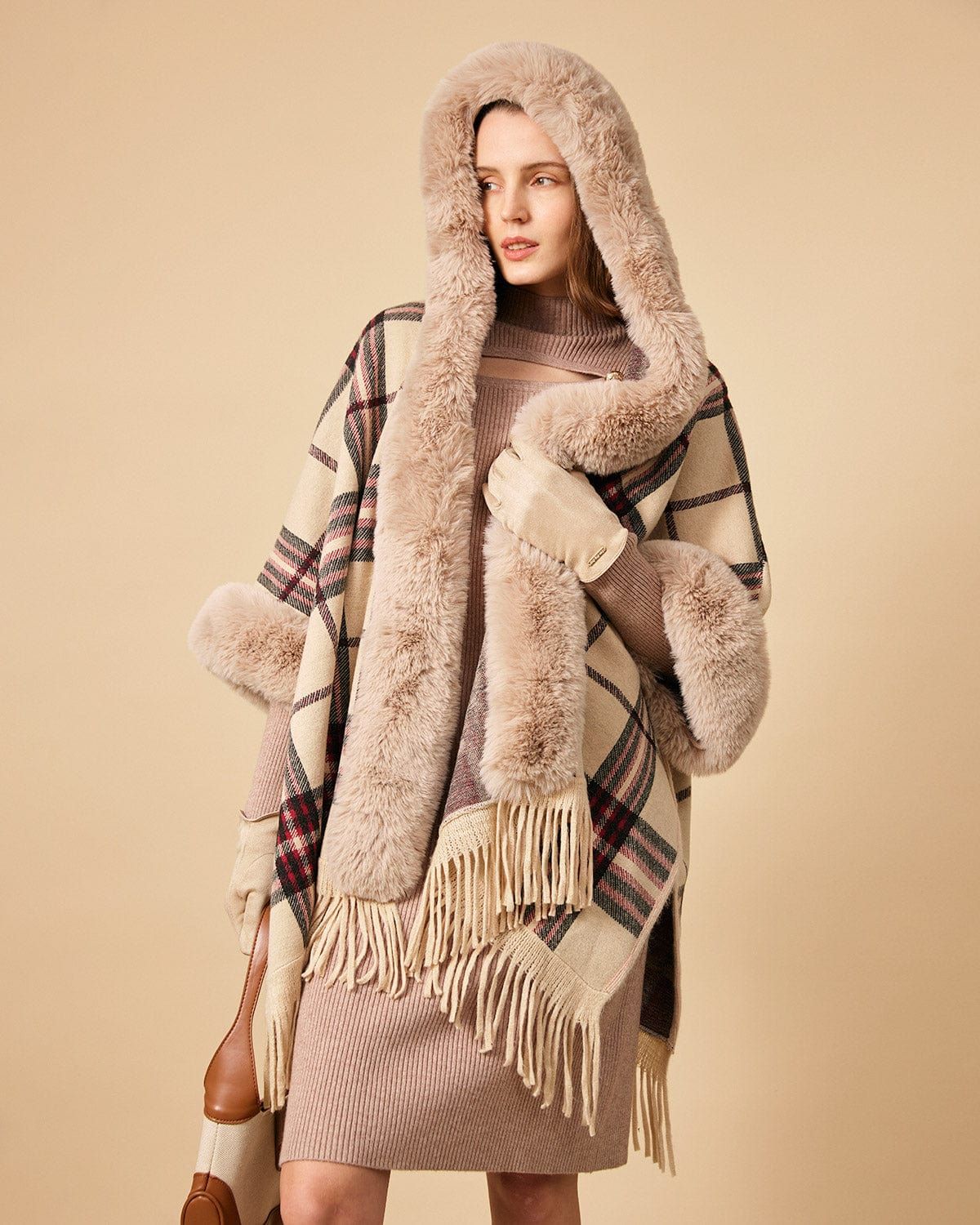 The Faux Fur Trim Hooded Cape sold by rihoas