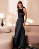 The Black Halter Bowknot Cutout Maxi Dress sold by rihoas